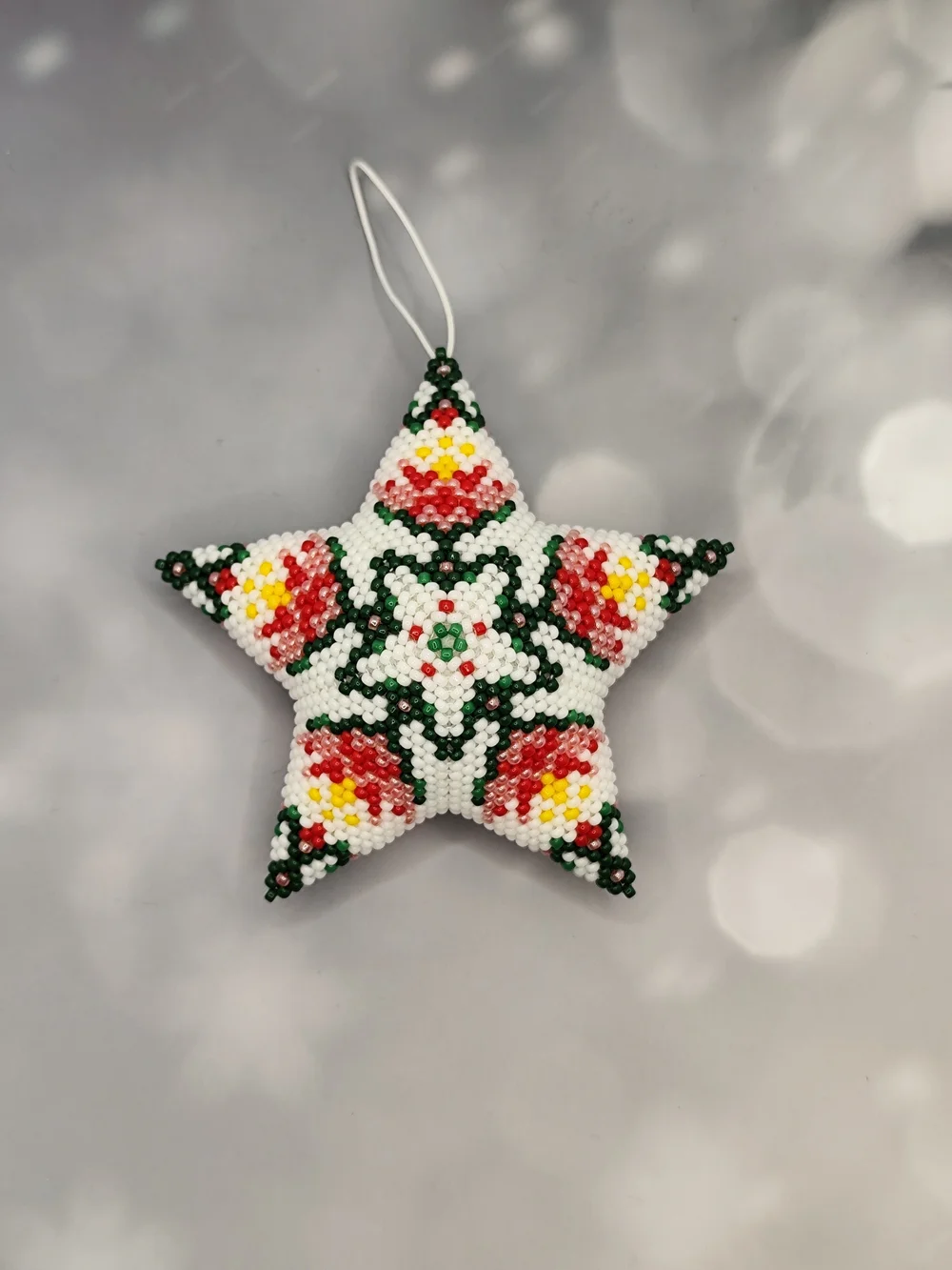 Handmade White Beaded Star Holiday Ornament with Red, Green & Yellow Accents
